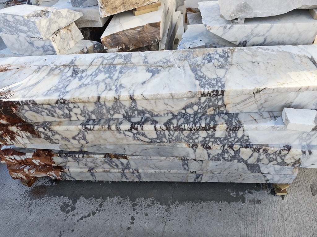 Custom Calacatta Viola Fireplace surround for Sarah